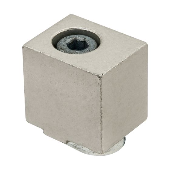 solid, rectangular block with a hex screw set into a hole at the top on the left side