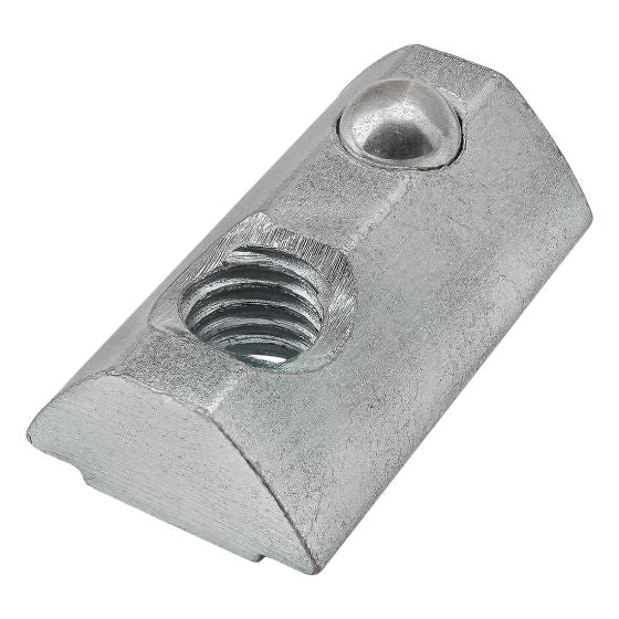 top view of a rectangular t-nut with an angled rounded top, a threaded hole on the left side and a ball spring on the right side