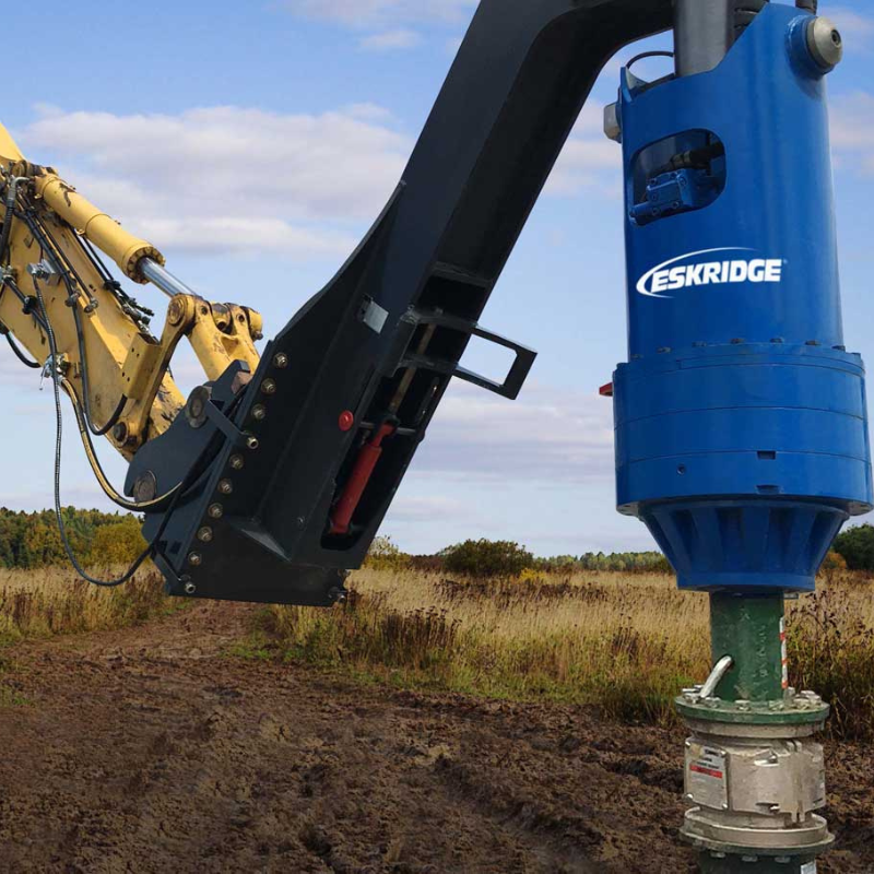 Tractor with Eskridge drill attachment 