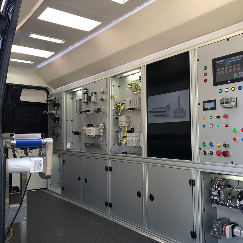 Inside look at TECO's automation van with panels showing components