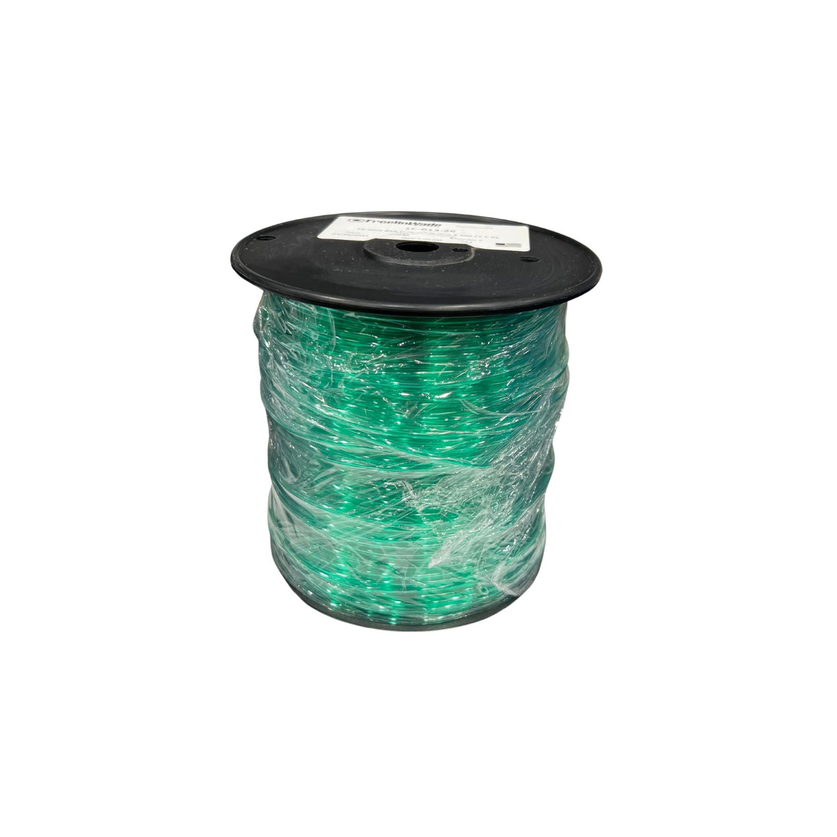 transparent green tubing in black reel