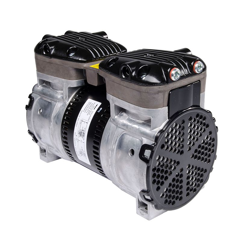 cylinder shaped pump with bottom mounts and a square piece on the top of each half of the pump