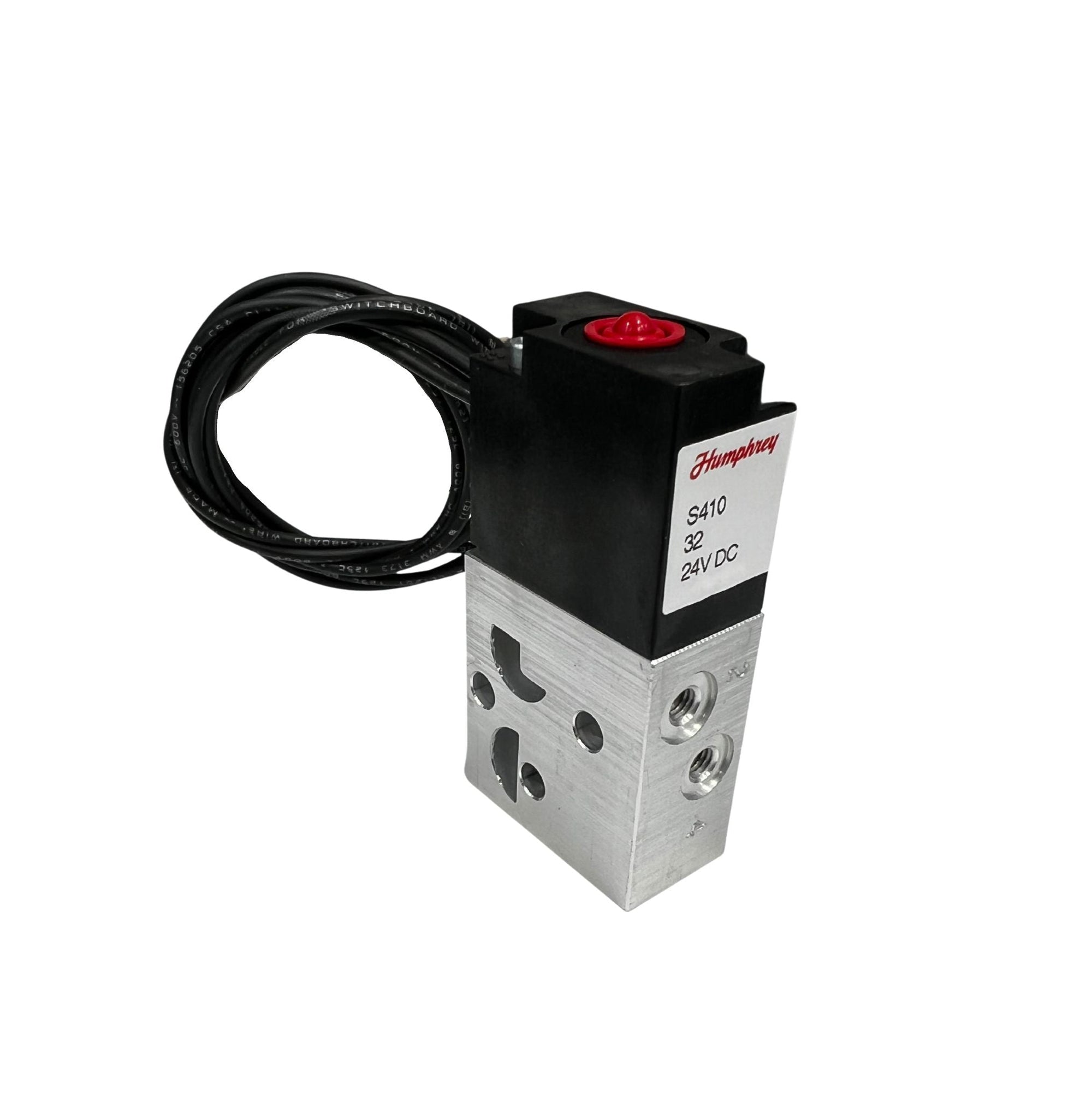 side view of an upright rectangular valve with an aluminum bottom half with two ports, and a black plastic top half with a red button on top, and electrical wire coiled at the back of the unit