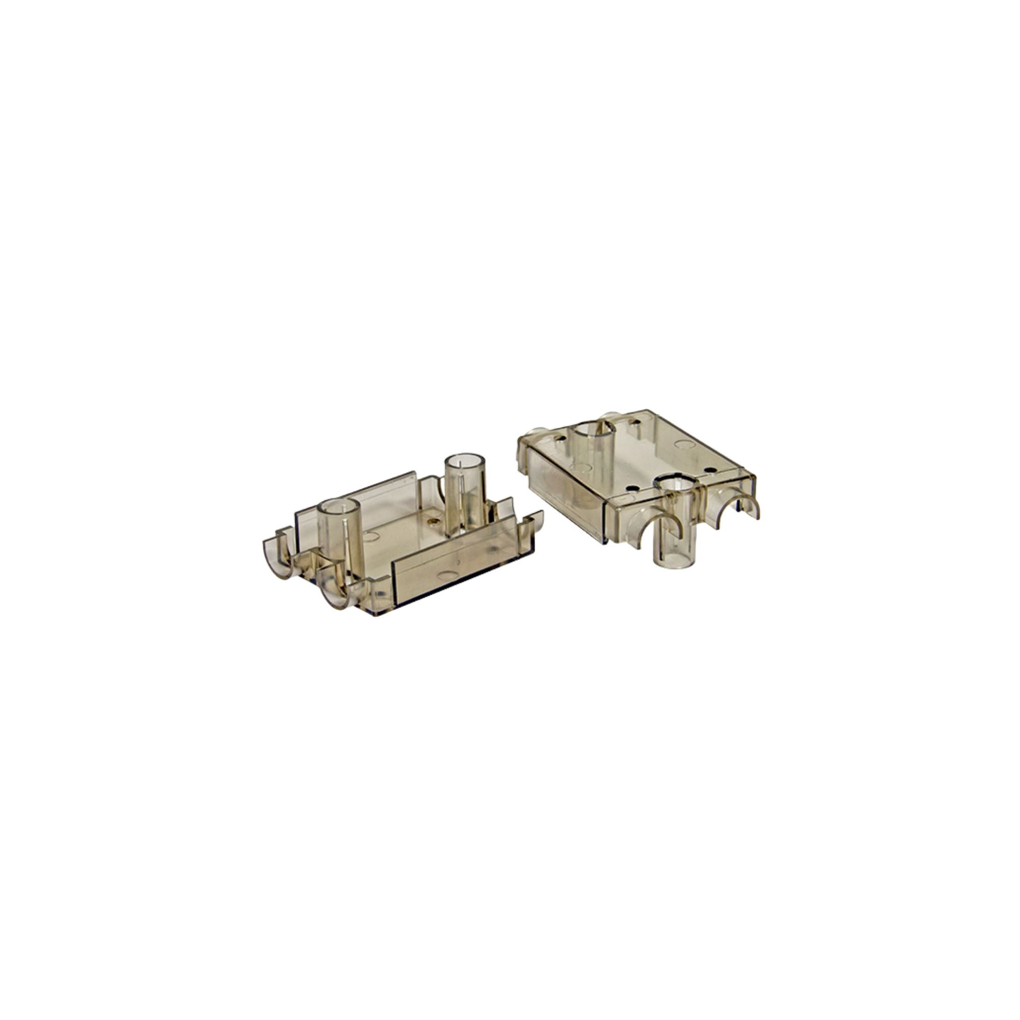 two clear rectangular pieces of a relay cover