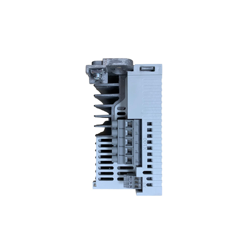 grey, rectangular power unit, with a terminal block in the center and a metal hinge and screw on the top left