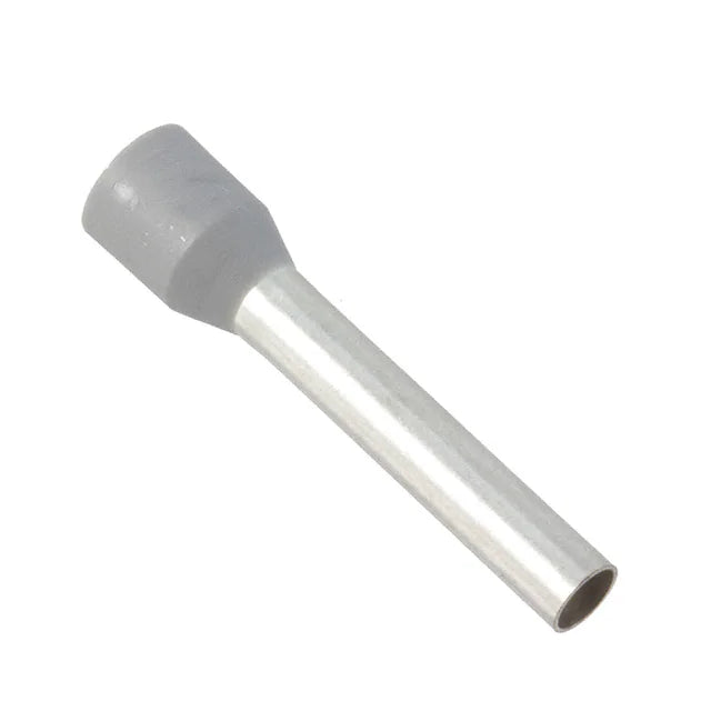 top view of a diaganolly placed wire-end ferrule with a white insulator collar on the top left and a metal contact pointing toward the bottom right