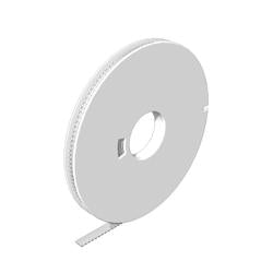 side view of an upright white disc with white material spooled around it