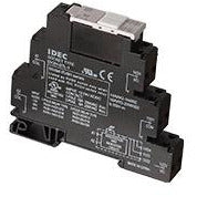 Black plastic that connects to a din rail.